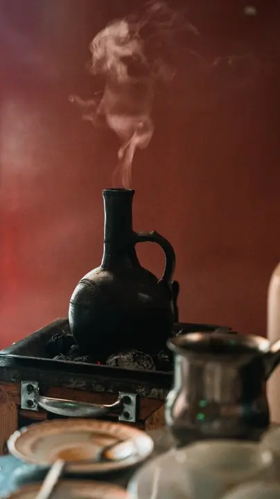 Coffee steaming from a jebena